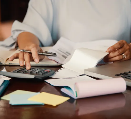 CPA reviewing bookkeeping records and business financial statements