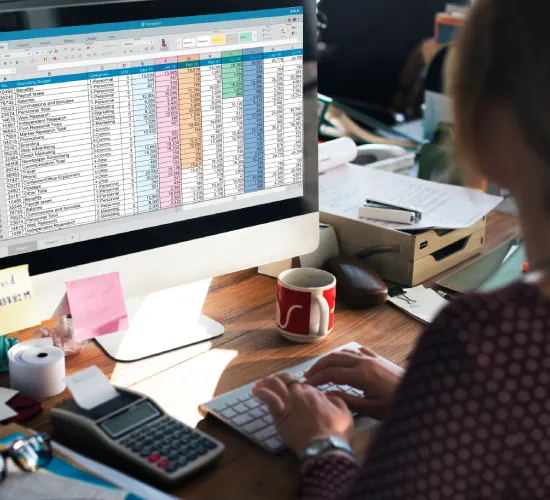 Payroll records being reviewed for employee processing and tax filings